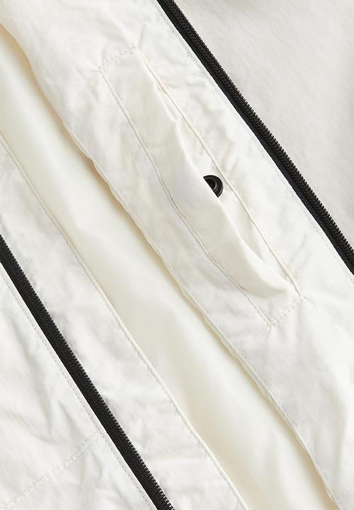 H&M - Regular fit windbreaker - beige/white