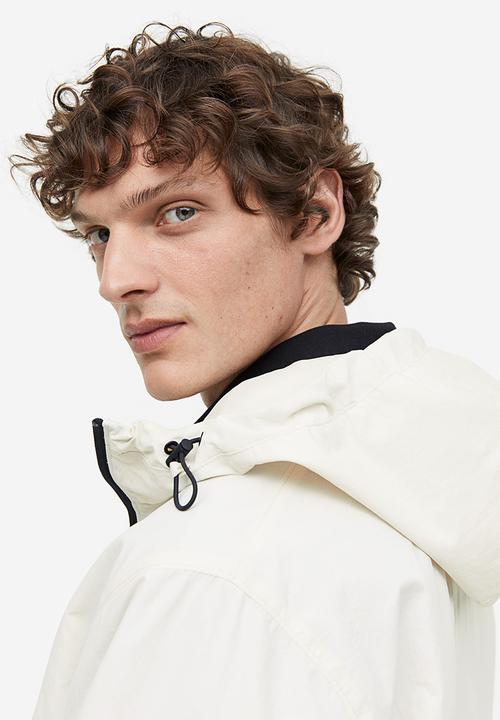 H&M - Regular fit windbreaker - beige/white