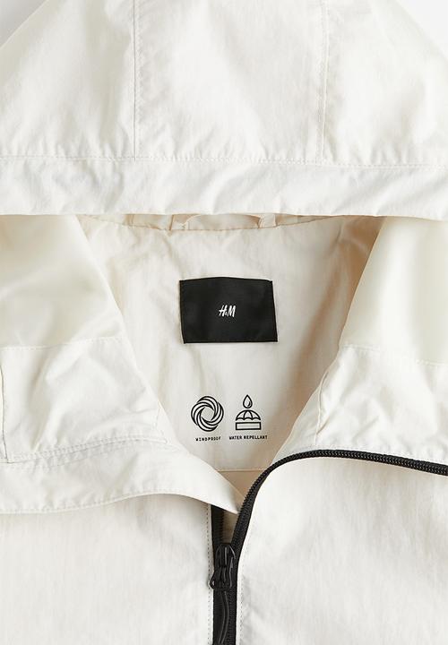 H&M - Regular fit windbreaker - beige/white