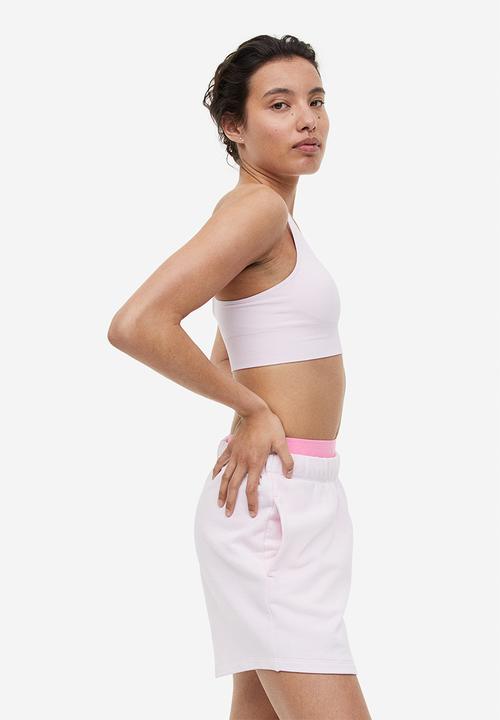 H&M - Drymove™ medium support sports bra - light pink