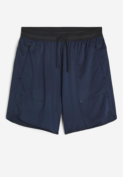 H&M - Drymove™ stretch sports shorts with zipped pockets - blue