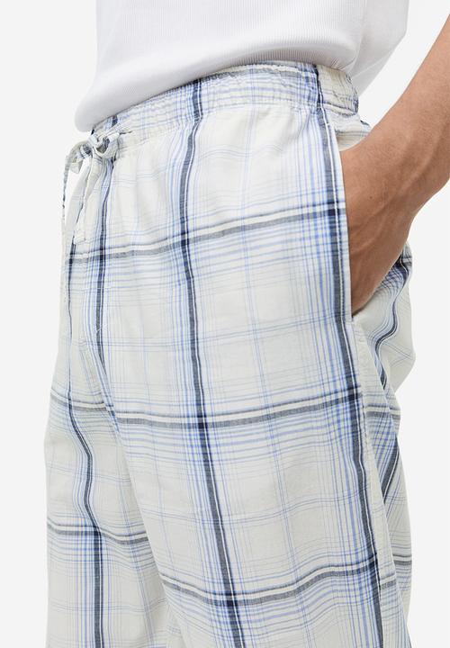 H&M - Relaxed fit pyjama bottoms - Light blue Checked