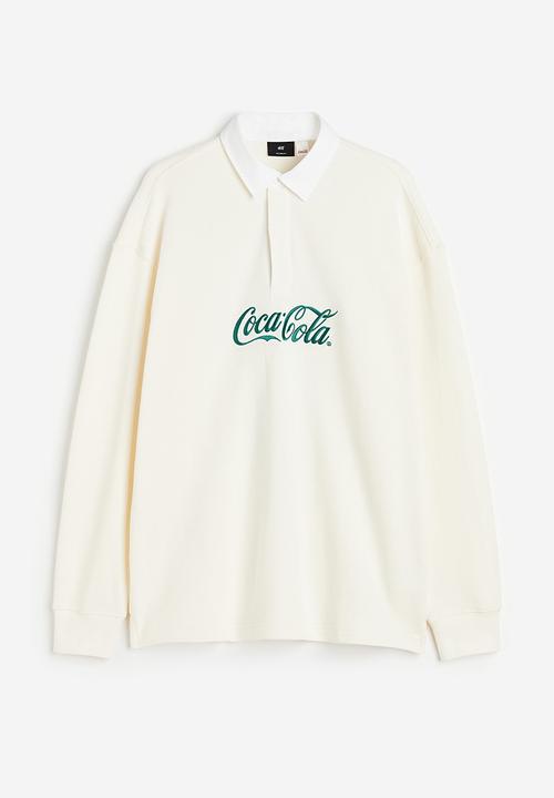 H&M - Relaxed fit printed polo shirt - Cream Coca-Cola