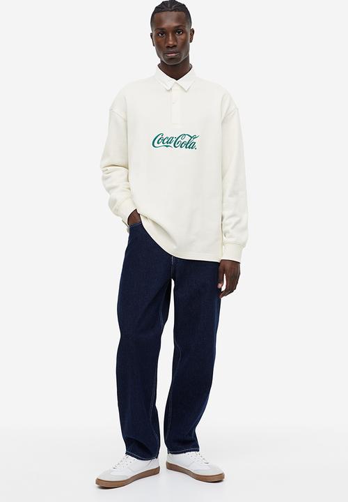 H&M - Relaxed fit printed polo shirt - Cream Coca-Cola