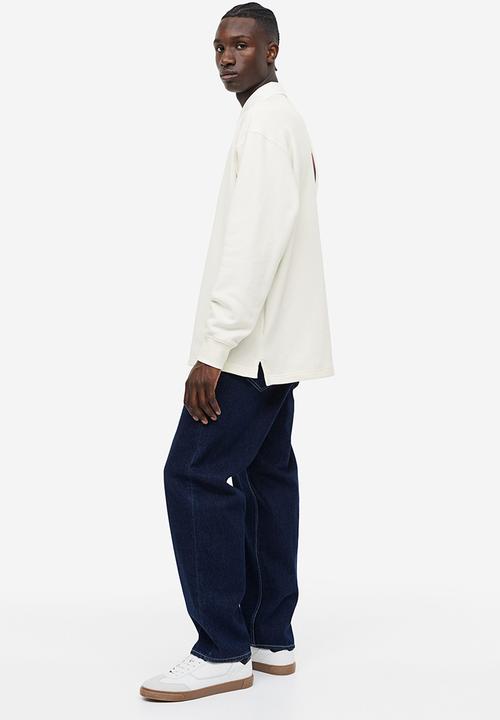 H&M - Relaxed fit printed polo shirt - Cream Coca-Cola