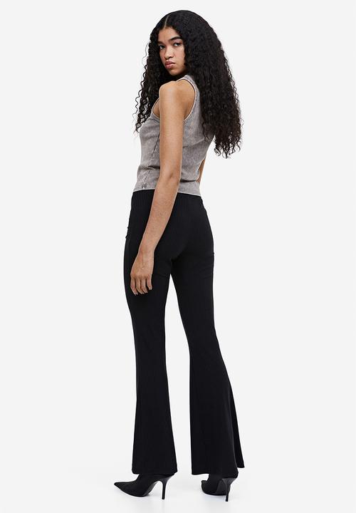 H&M - Flared trousers - black