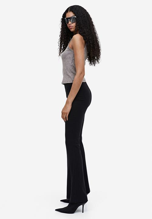 H&M - Flared trousers - black