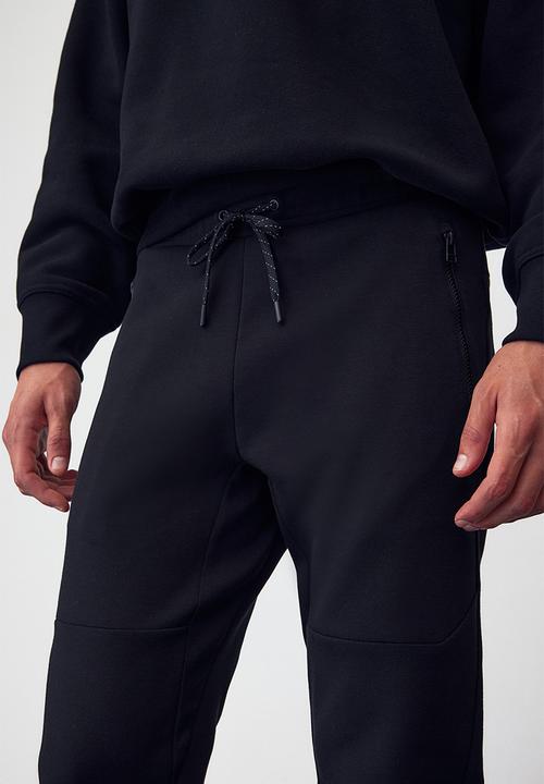H&M - Drymove™ tapered tech joggers with zipped pockets - black