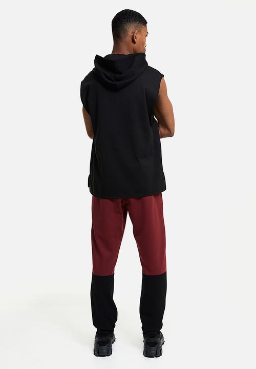 H&M - Drymove™ tapered tech joggers with zipped pockets - red