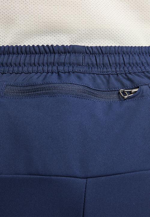 Nike - Dri-FIT track club pants - midnight navy/summit white