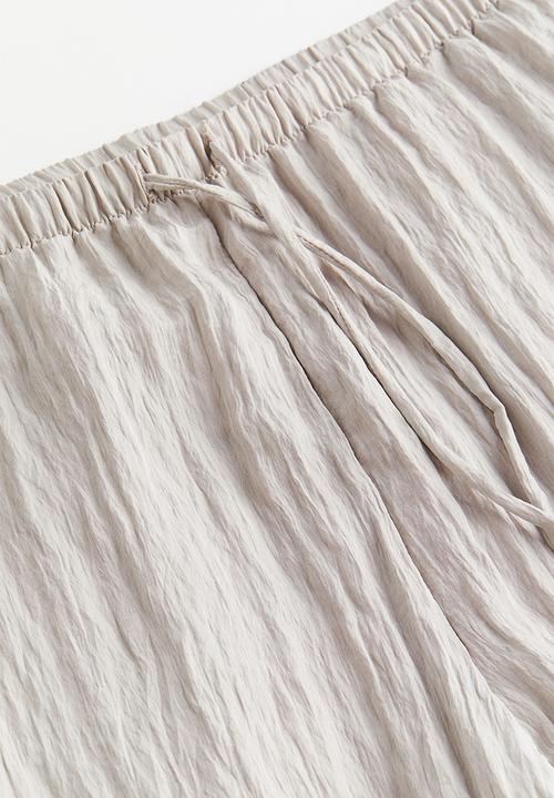 H&M - Crinkled loungewear trousers - light greige