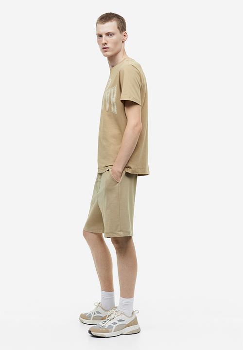 H&M - Regular fit printed T-shirt - Beige Harlem