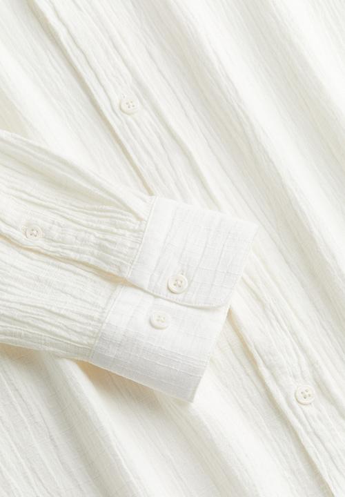 H&M - Regular fit crinkled shirt - cream