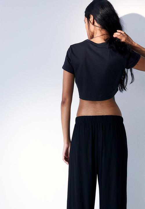 H&M - Loose fit trousers - black
