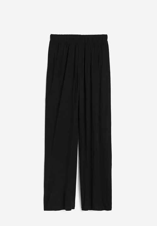 H&M - Loose fit trousers - black