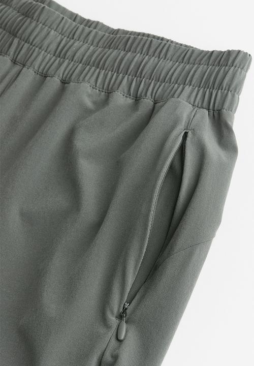 H&M - Drymove™ running trousers - dark khaki green