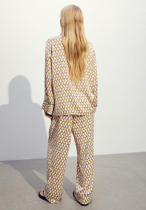 H&M - Wide satin trousers - yellow/patterned