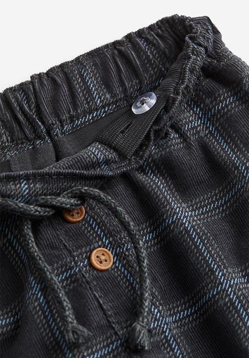 H&M - Fully lined corduroy trousers - dark grey checked