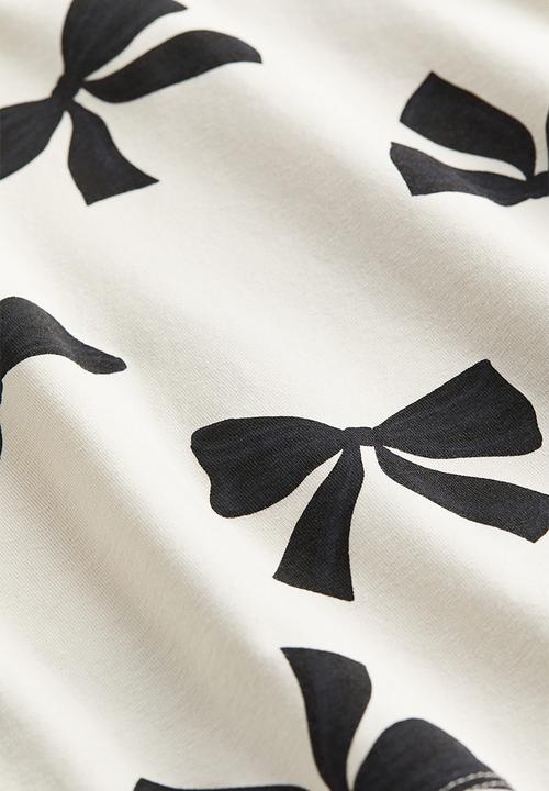 H&M - Printed jersey top - white bows