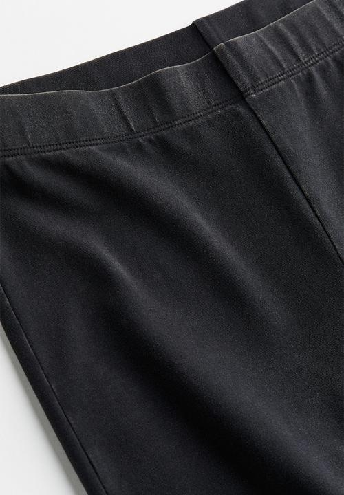 H&M - Flared trousers - black