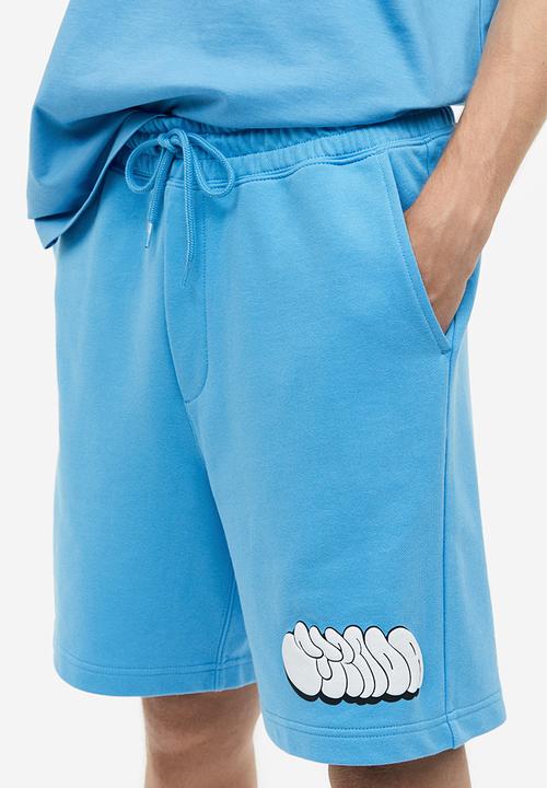 H&M - Relaxed fit printed sweatshorts - light blue/strada