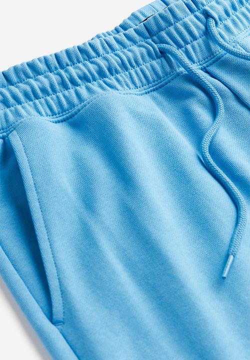 H&M - Relaxed fit printed sweatshorts - light blue/strada