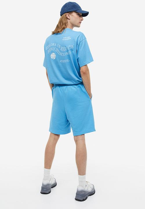 H&M - Relaxed fit printed sweatshorts - light blue/strada