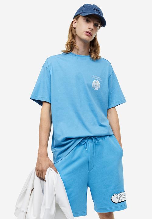H&M - Relaxed fit printed sweatshorts - light blue/strada