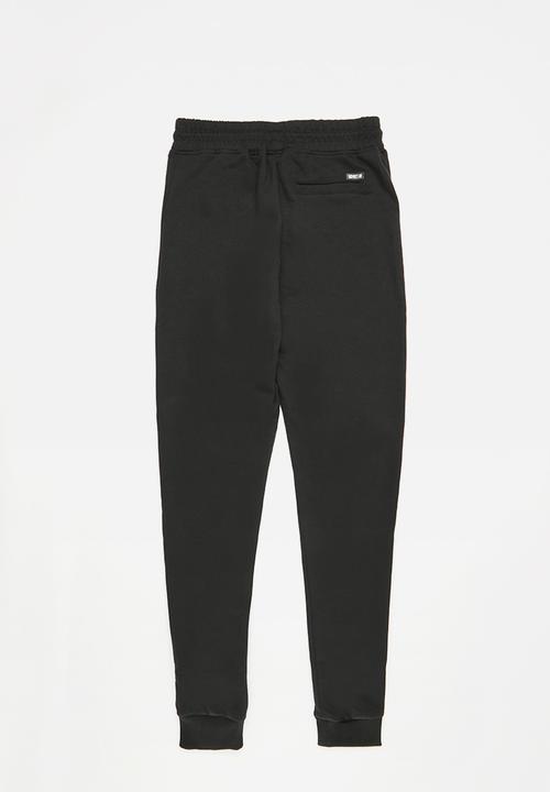 SOVIET - Track pants - black
