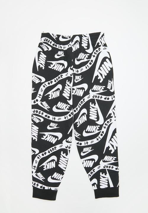 Nike - Nike all-over print joggers - black