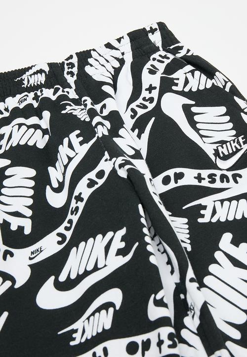 Nike - Nike all-over print joggers - black