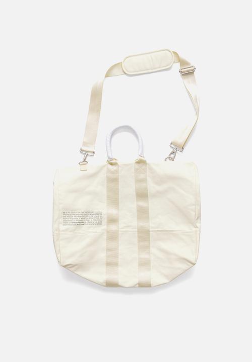 H&M - Canvas weekend bag - light beige 