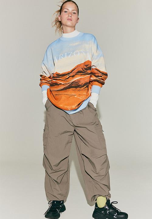 H&M - Oversized printed sweatshirt - light blue/arizona