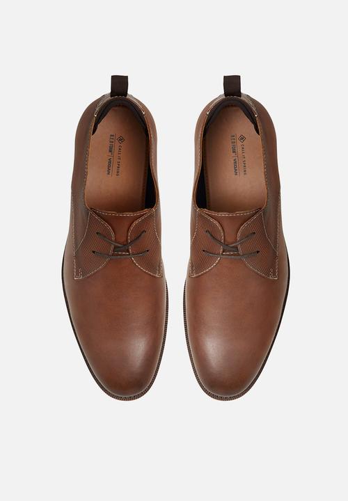 Call It Spring - Wolfe - cognac