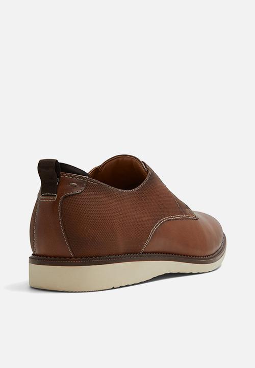 Call It Spring - Wolfe - cognac