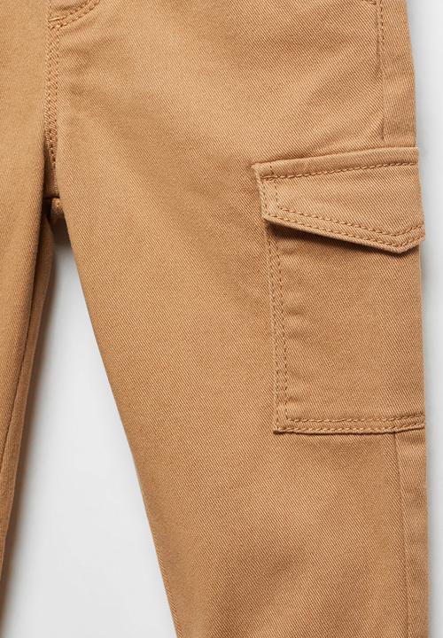 MANGO - Trousers flores - tobacco-brown