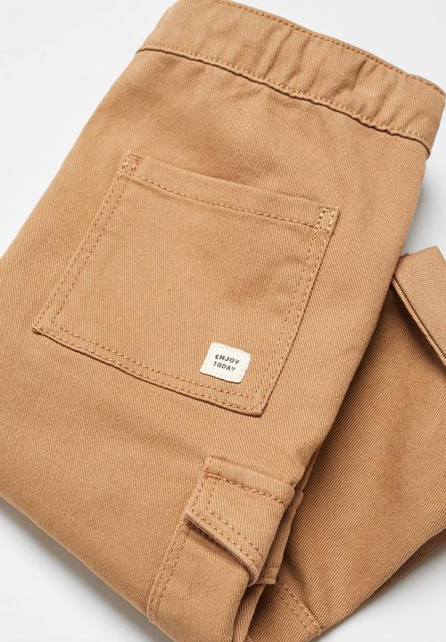 MANGO - Trousers flores - tobacco-brown