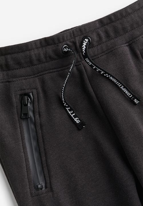 H&M - Joggers - black & racing car