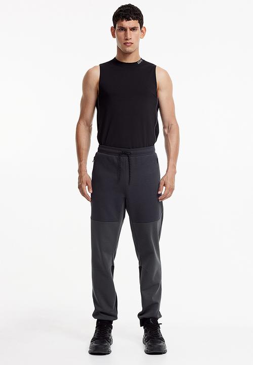 H&M - Drymove™ tapered tech joggers with zipped pockets - black