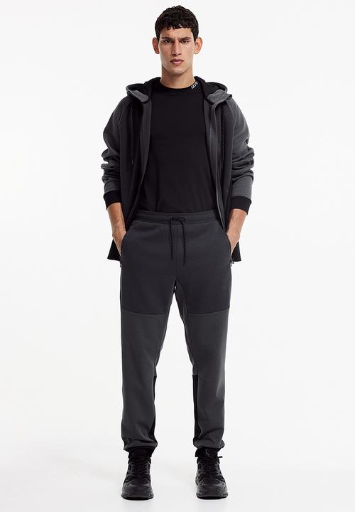 H&M - Drymove™ tapered tech joggers with zipped pockets - black