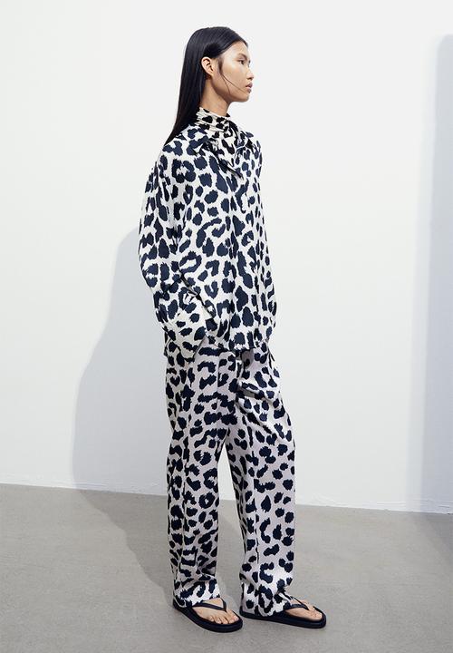 H&M - Straight trousers - white & black 