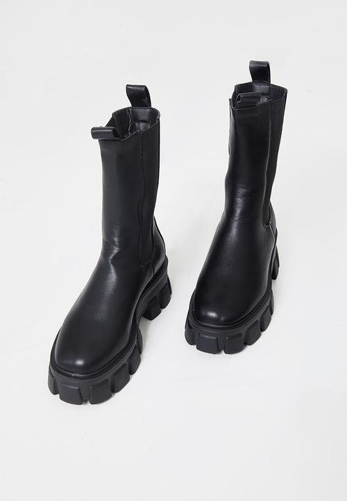 PrettyLittleThing - Black extreme chunky sole calf high chelsea boots - black