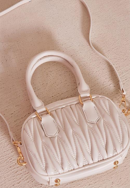 PrettyLittleThing - Cream quilted rounded cross body bag - cream
