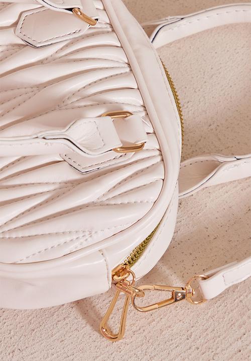 PrettyLittleThing - Cream quilted rounded cross body bag - cream