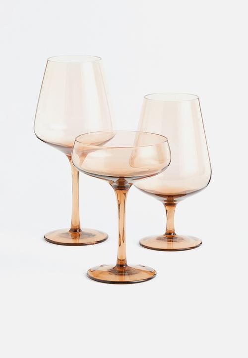 H&M - Champagne coupe - amber-coloured