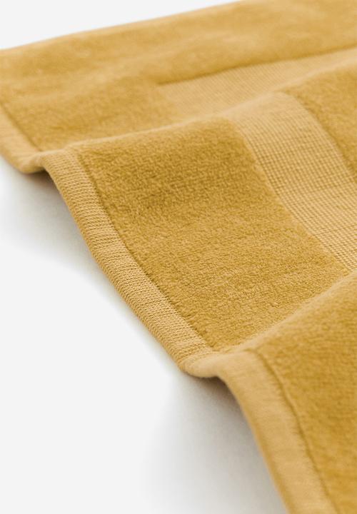 H&M - Velour bath mat - yellow