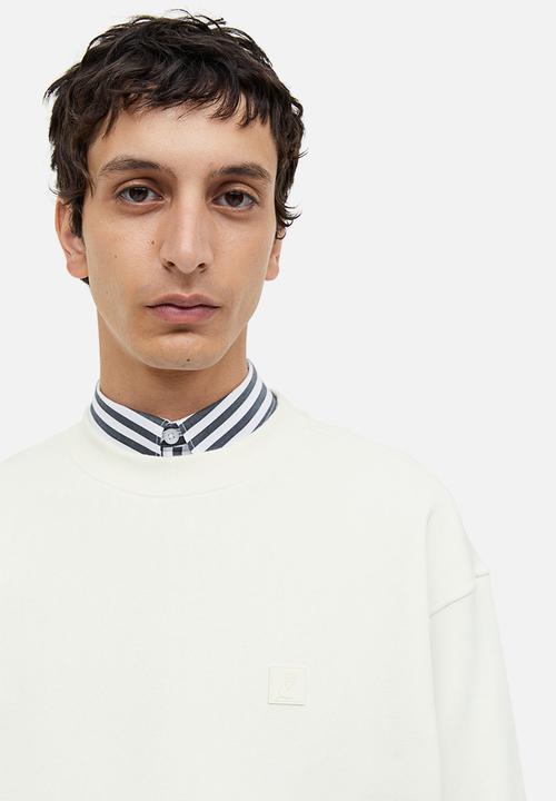 H&M - Relaxed fit appliquéd sweatshirt - cream 