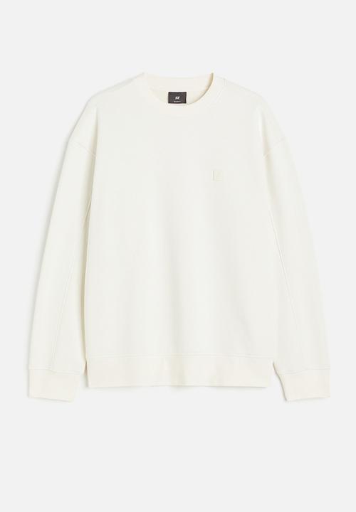 H&M - Relaxed fit appliquéd sweatshirt - cream 