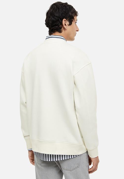 H&M - Relaxed fit appliquéd sweatshirt - cream 