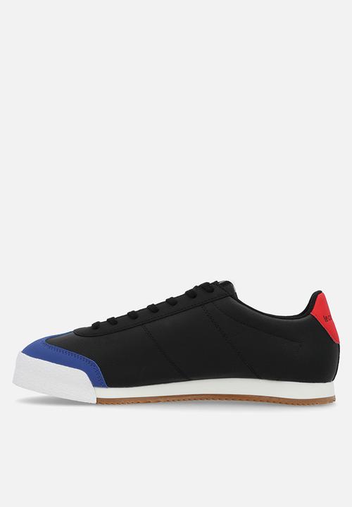 Le Coq Sportif - Foot sport - black/tricolour